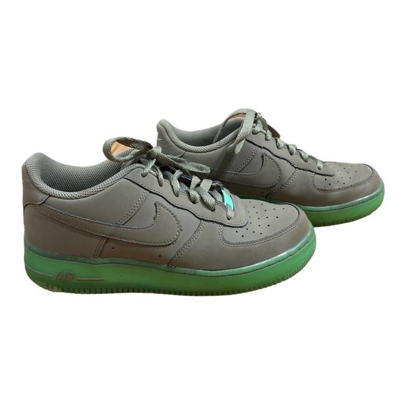 green and grey nike shoes